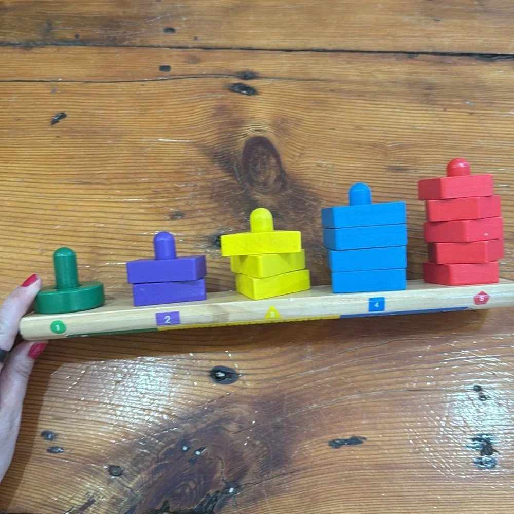 Melissa & Doug Stack and Sort Board Wooden Educational Toy 15 Solid Wood Pieces